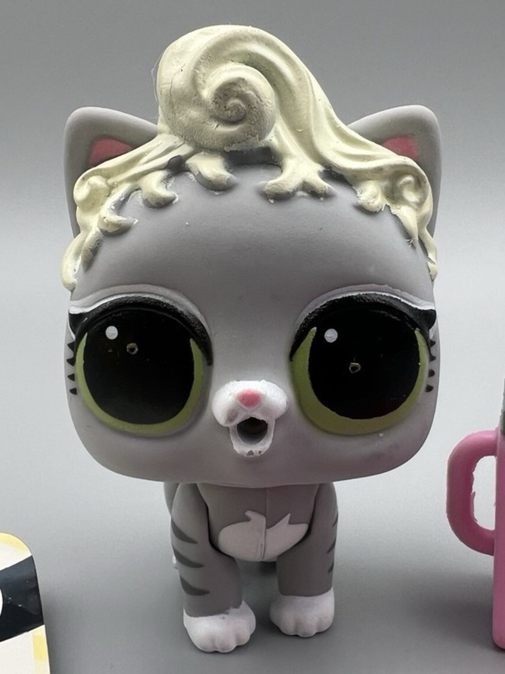 Gray Kitty Figure with Blonde Hair and Green Eyes
